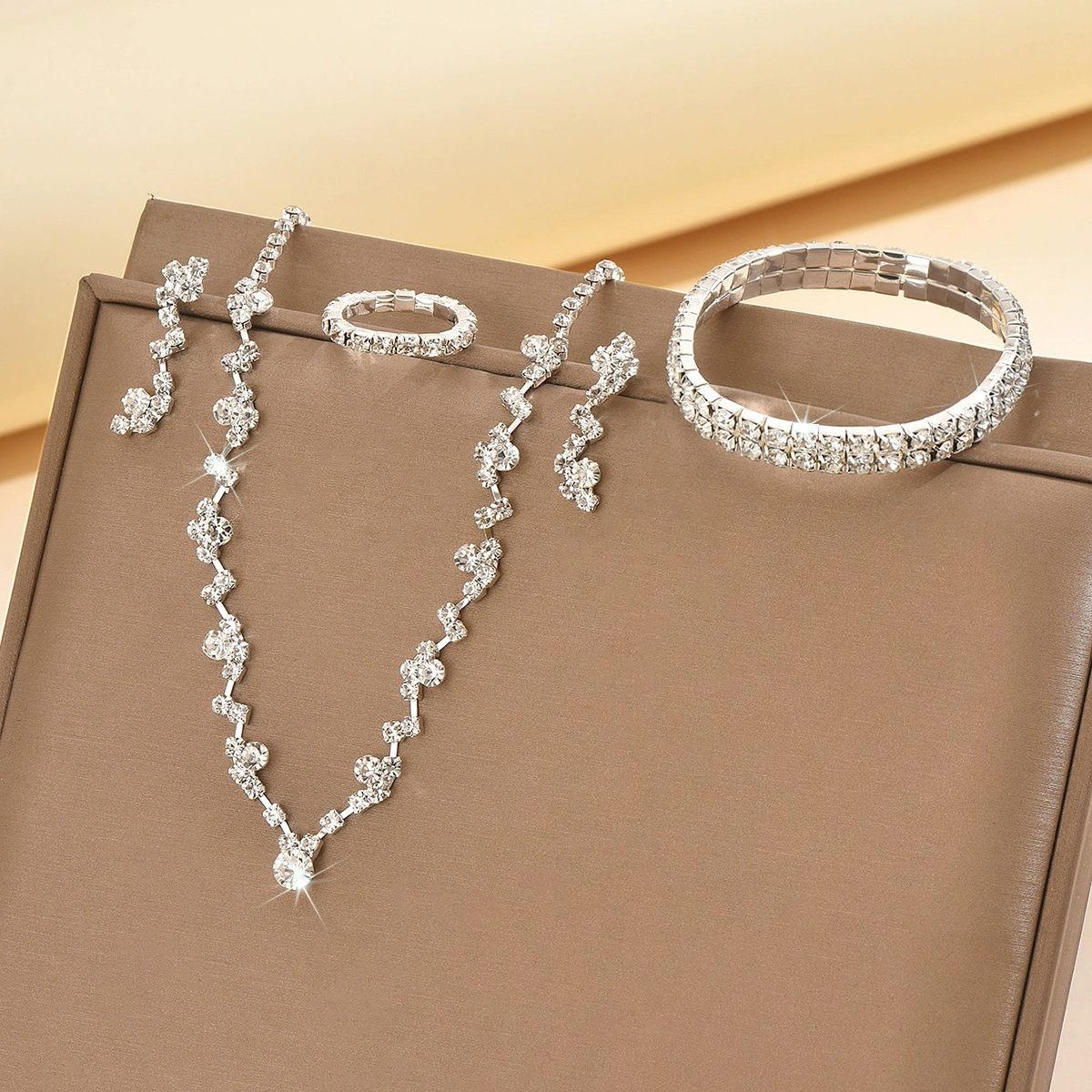 Sophisticated necklace and earrings, bracelet, set, chain for key bag , dress, accessory, simple and elegant design, 3 piece set, diamond encrusted