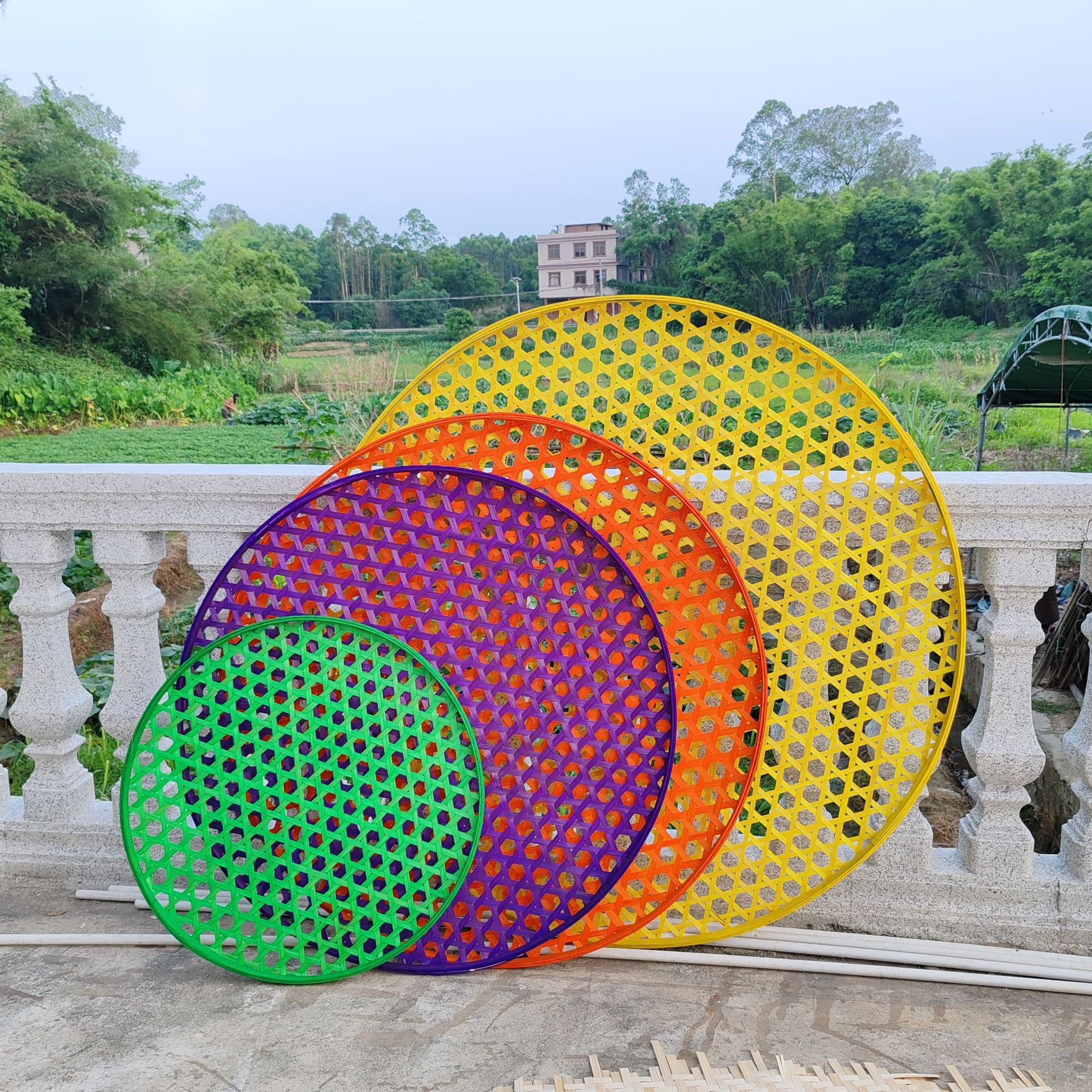 Hexagonal colored bamboo woven round winnowing basket with large holes, bamboo sieve for outdoor decoration