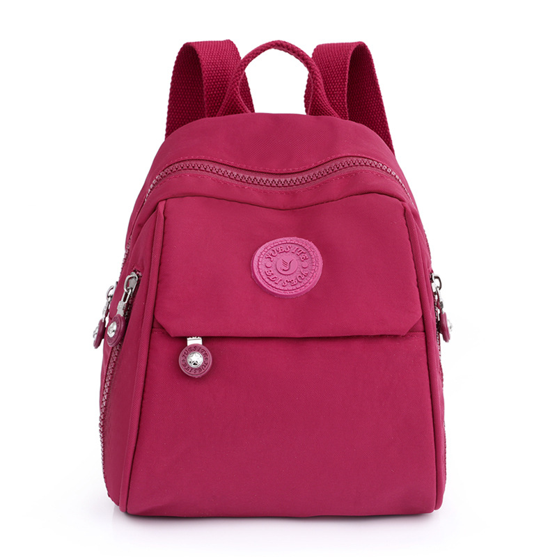 Mochila para mujer, mochila pequeña de tela Oxford de gran capacidad, resistente al agua, nueva mochila escolar de nailon lavanda de todo fósforo de moda
