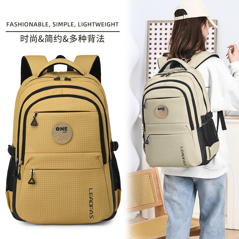 Cross-border 2025 nueva mochila de gran capacidad de protección de espalda para estudiantes de secundaria y secundaria mochila de viaje de ocio