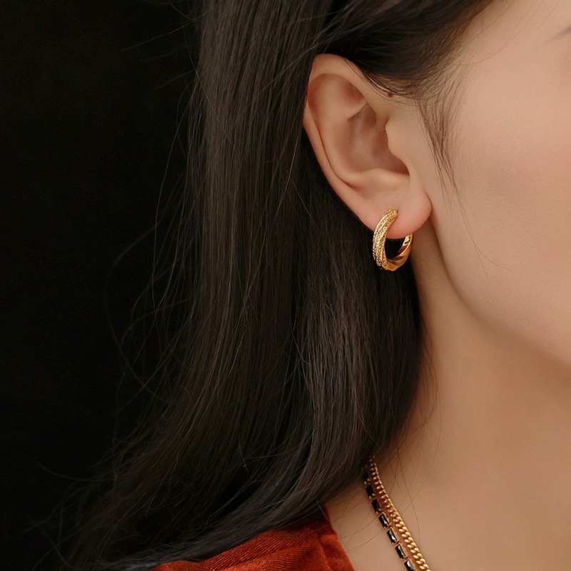 Europa y América delicada textura de alta sensación de perfiles de zircon geometría irregular estilo temperamento de moda aretes de moda