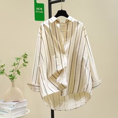 綿春秋の新型縦縞のゆったりした長袖のシャツの女性のファッションのカジュアルな韓国版の百合のカーディガンのシャツの女性は外着します。
