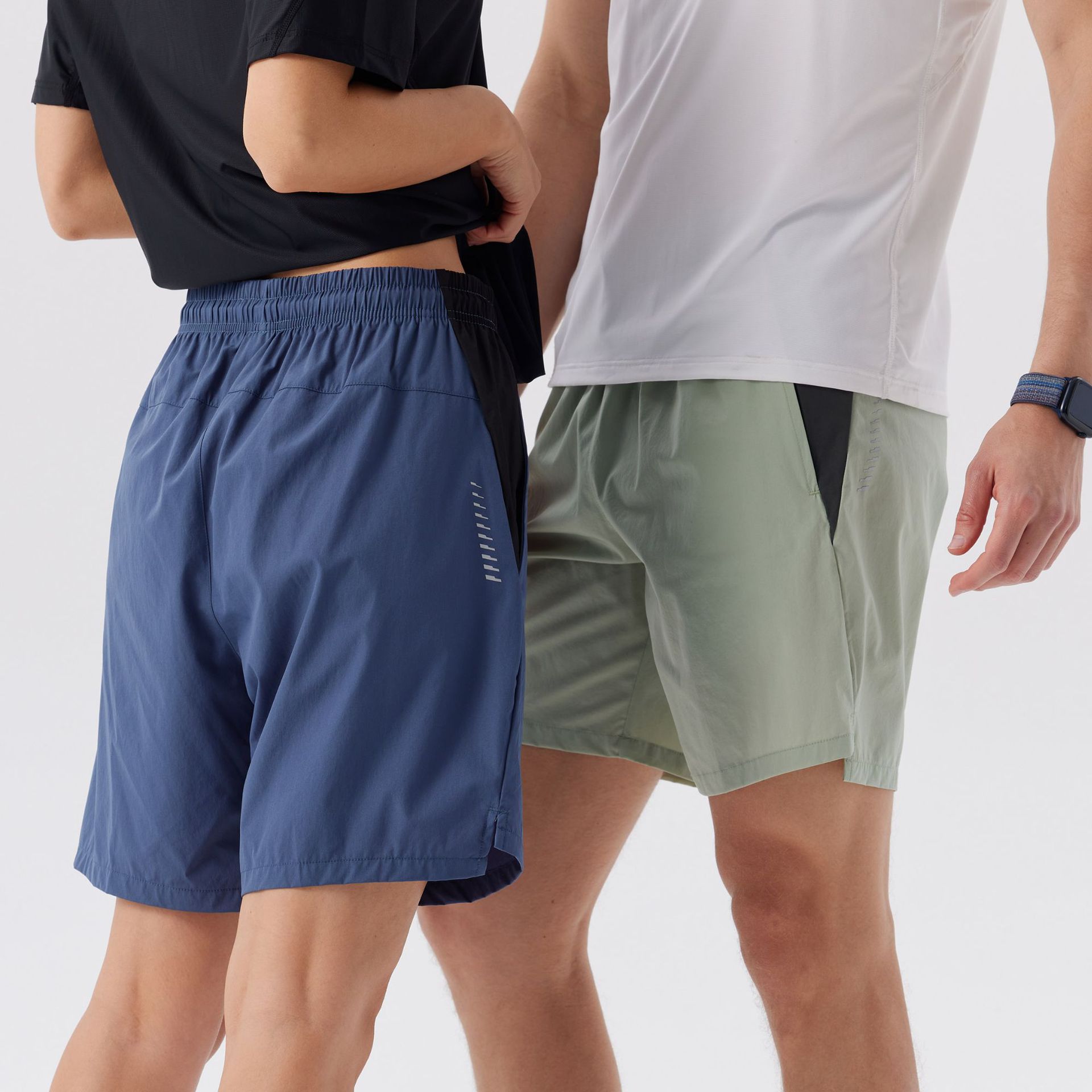 Pantalones cortos deportivos de color contrastante de empalme para hombres de verano frescos secos rápidos para correr Pantalones cortos de entrenamiento de tiro para hombres