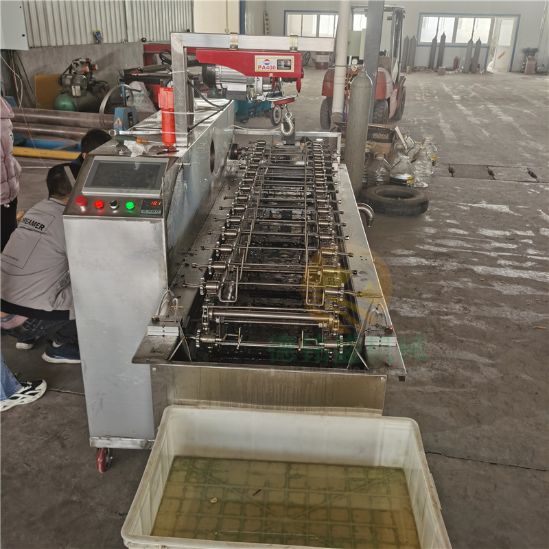 解放人工盘花的金丝馓子油炸机 小型馓子机 连续式馓子油炸机