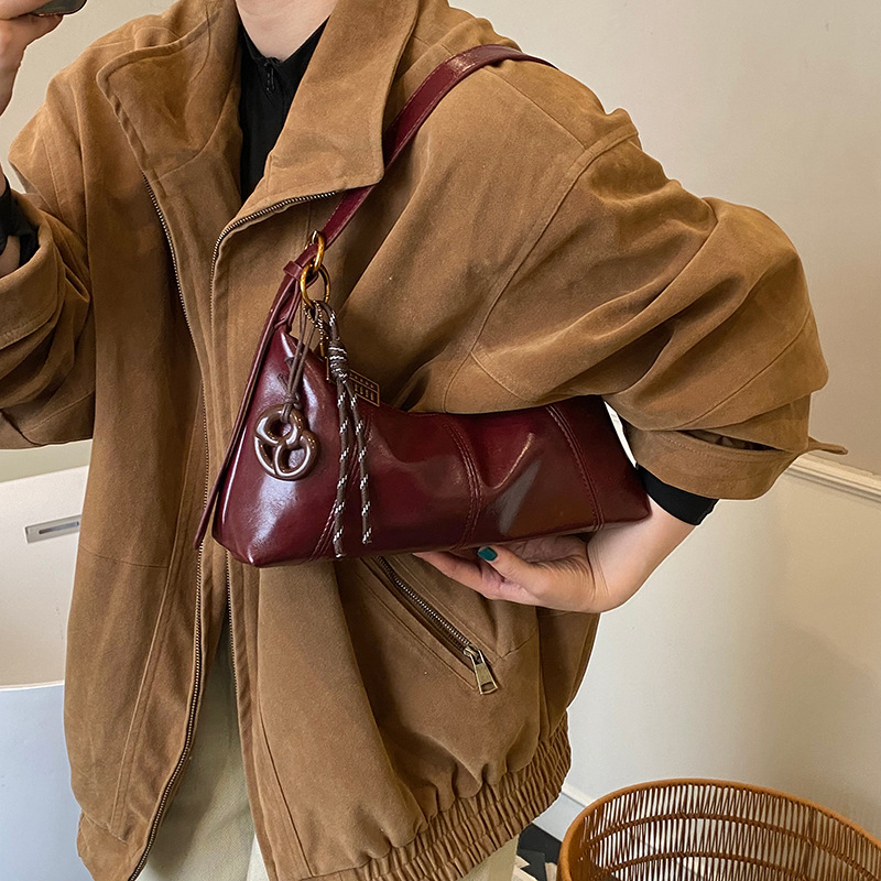 Bolso de brazo de nicho coreano, bolso de palo de mujer 2025, otoño y invierno, nueva moda, bolso de hombro de viaje al trabajo