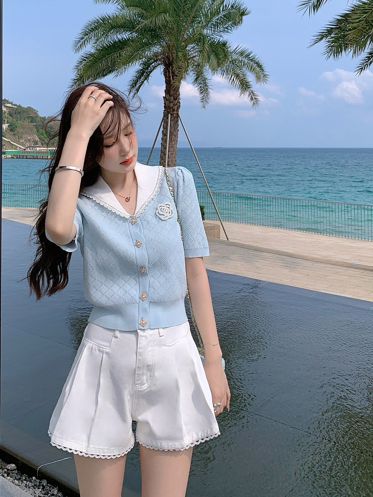 Áo thun nữ cổ lật tay ngắn dệt kim phong cách Pháp — Màu xanh da trời