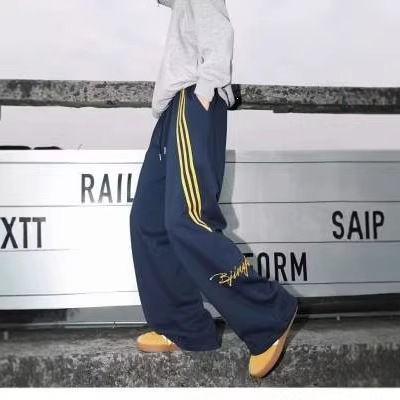 Pantalones de protección de otoño nuevo estilo de ropa de trabajo americano azul tibetano dos barras de calzada deportiva calzado de la escuela para hombres pantalones casuales