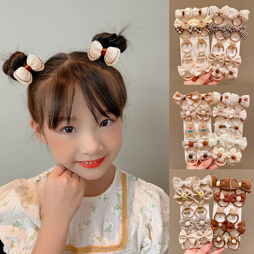 Milky brown ten-piece set of children's hair ties with high elasticity and no damage to the hair. Rubber bands and hair ropes to tie the hair. Cute baby hair accessories.