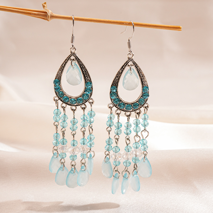 Europa y los Estados Unidos con diamantes de vidrio hueco en forma de gota de agua gancho de orejas bordado estilo nacional retro lujo ligero nicho de alta calidad pendientes para mujeres
