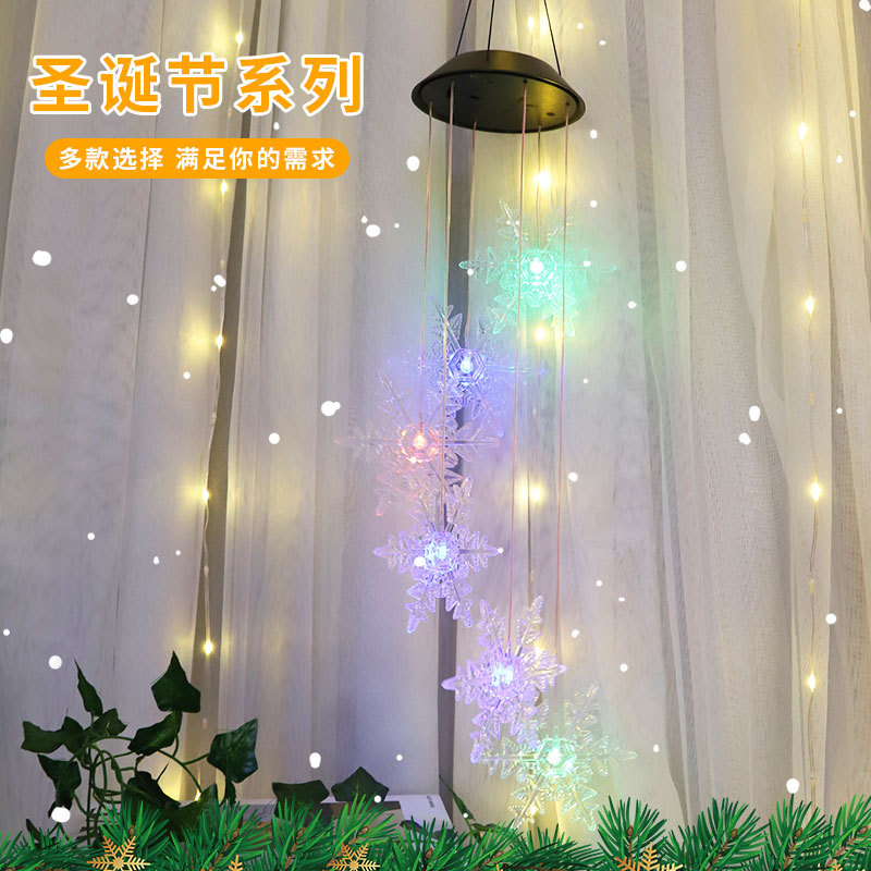 Nueva Navidad atmósfera decoración carillón de viento luz estrella copo de nieve protección del medio ambiente solar led carillón de viento Cadena de luz transfronteriza Venta caliente