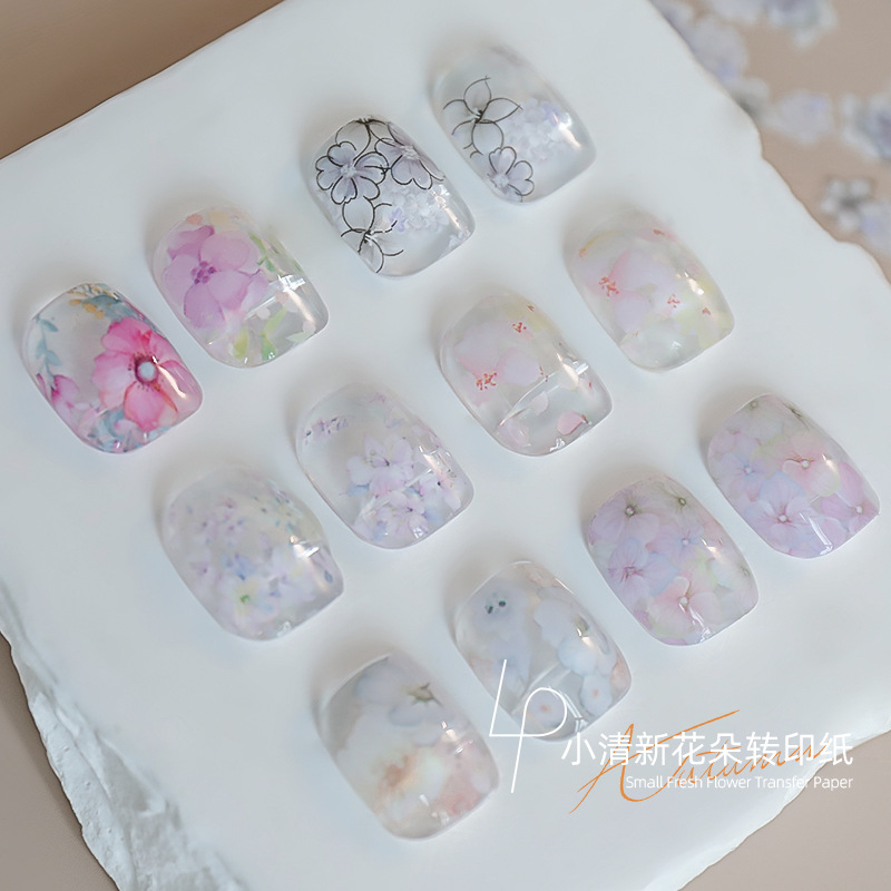 Nueva etiqueta de transferencia de arte de uñas flor mariposa papel de transferencia de encaje arte de uñas pequeño nuevo arte de uñas claro papel de transferencia de cielo estrellado al por mayor