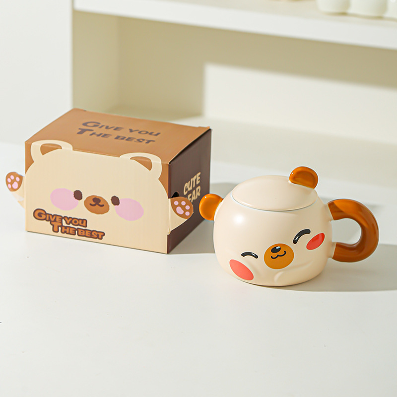 Taza de cerámica creativa de dibujos animados con tapa para desayuno casero de pareja de niños de alto valor de cara para acompañantes de regalo de taza