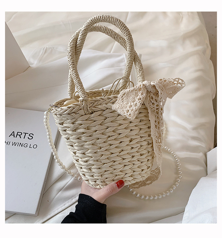 Women's Straw Solid Color Vacation Fashion Pearl Bowknot Bucket Shape Zipper Handbag Crossbody Bag display picture 4