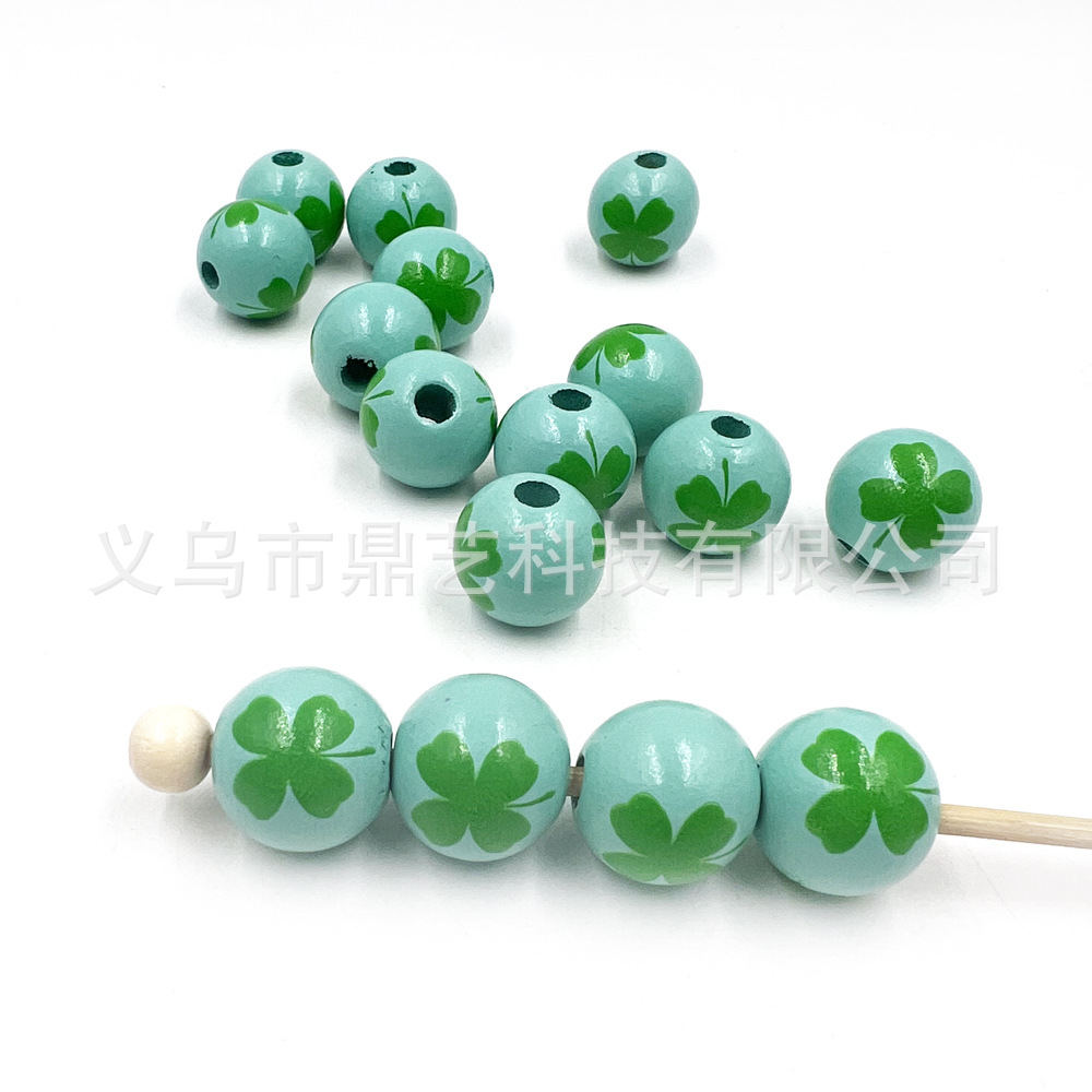卸売りプリント木珠アイルランド日木珠クローバー四葉草形散珠diyビーズアクセサリー部品