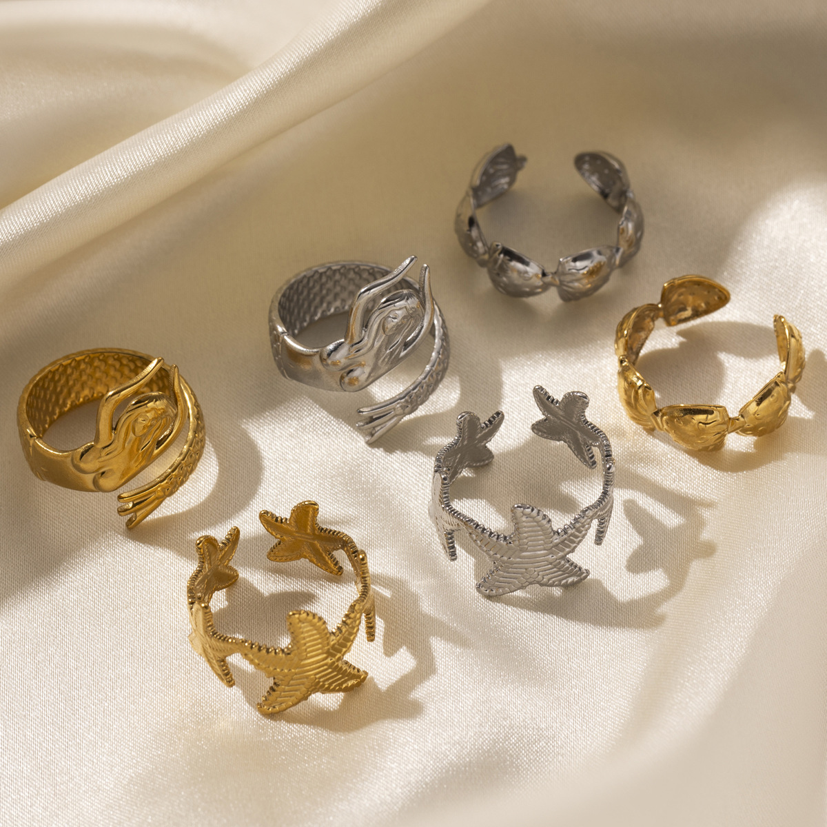 Anillo de acero de titanio al por mayor transfronterizo de Tena, lujo ligero, estrella de mar de nicho, sirena, soporte de acero inoxidable, joyería de mano de estilo europeo y americano
