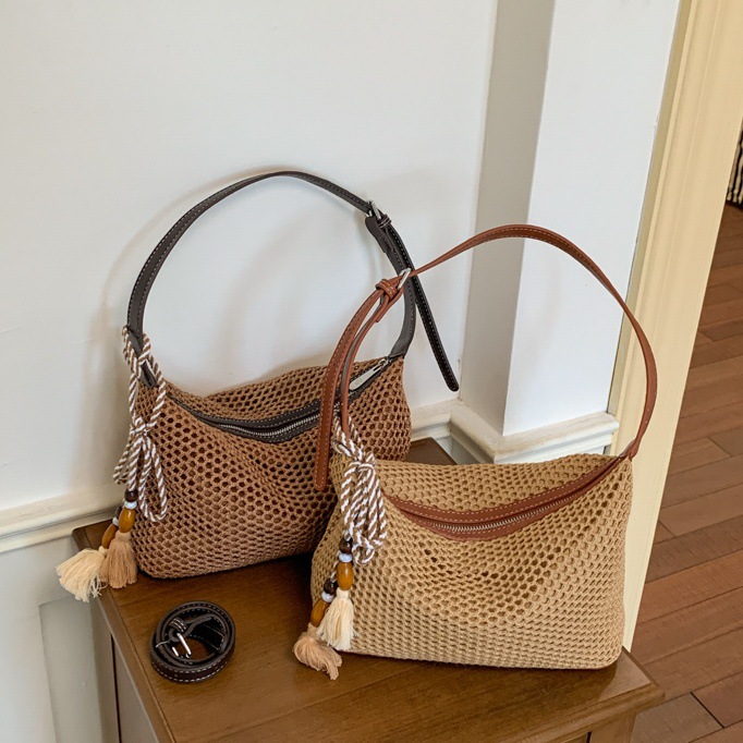 Nuevo verano retro hombro bajo la axila tela de paja bolsas de mujer trampolín oblicuo bolsas de tela de ocio diarias bolsas de playa de vacaciones