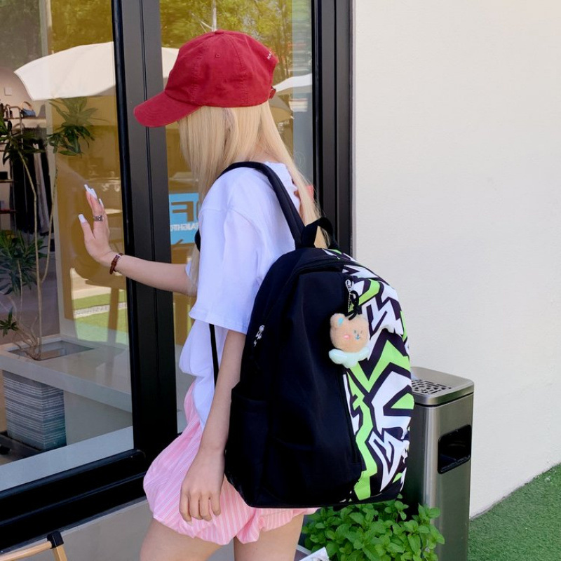 美式涂鸦书包男生小学生男孩时尚潮流初中生双肩包女小众校园背包