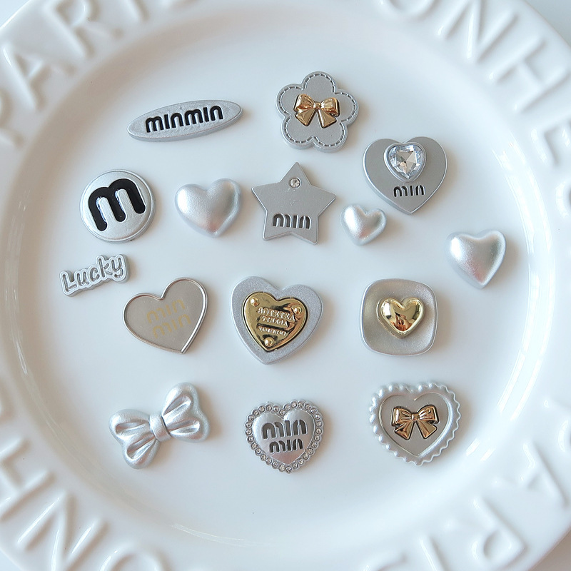 Hot sale electroplating love bow jewelry accessories high sense silver gray smiley hair clip headdress material wholesale Hot sale electroplating love bow jewelry accessories high sense silver gray smiley hair clip headdress material wholesale