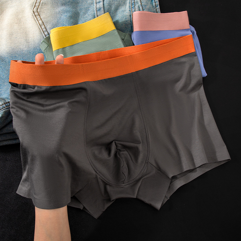 Pantalones de moda de color contrastante, delgadas y sin marcas de cintura media, pantalones de pierna suaves y cómodas, pantalones de entrepierna transpirables para hombres.