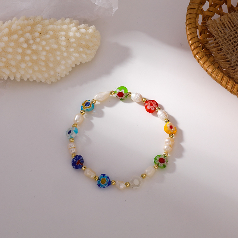 Adorable Bracelet Réglable Élastique Fait Main Avec Des Perles De Couleur Et Des Fleurs display picture 1