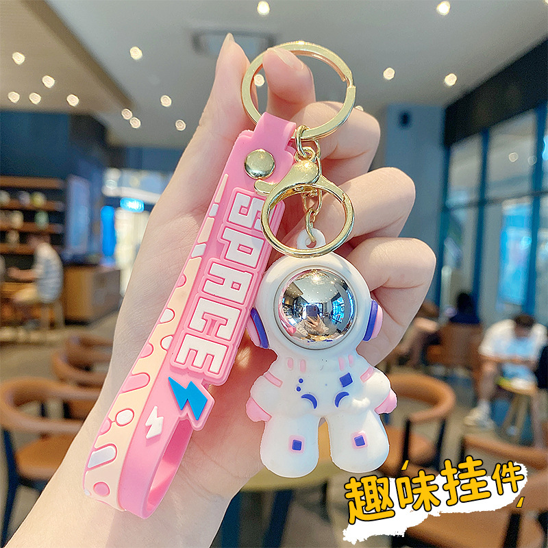 Dibujos animados cosmonauta astronauta astronauta muñeca llavero accesorios de automóvil creativos lindo bolso de pareja colgante regalo