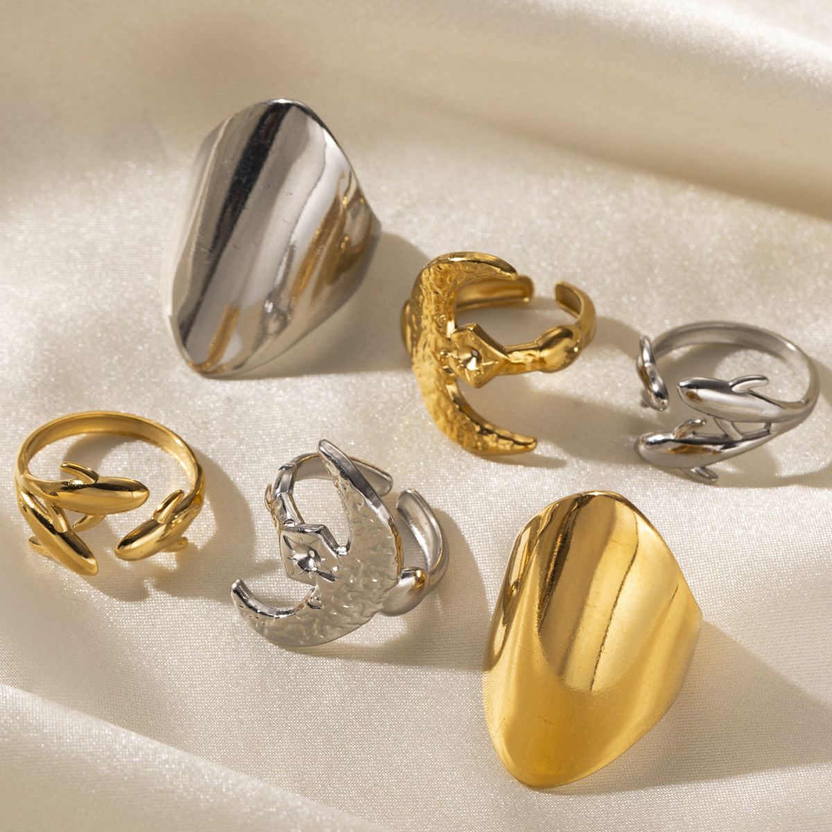 Anillo de acero inoxidable de estilo europeo y americano Tena Diseño de nicho femenino Luna lisa Delfín Anillo abierto Lujo ligero Sentido de alta gama