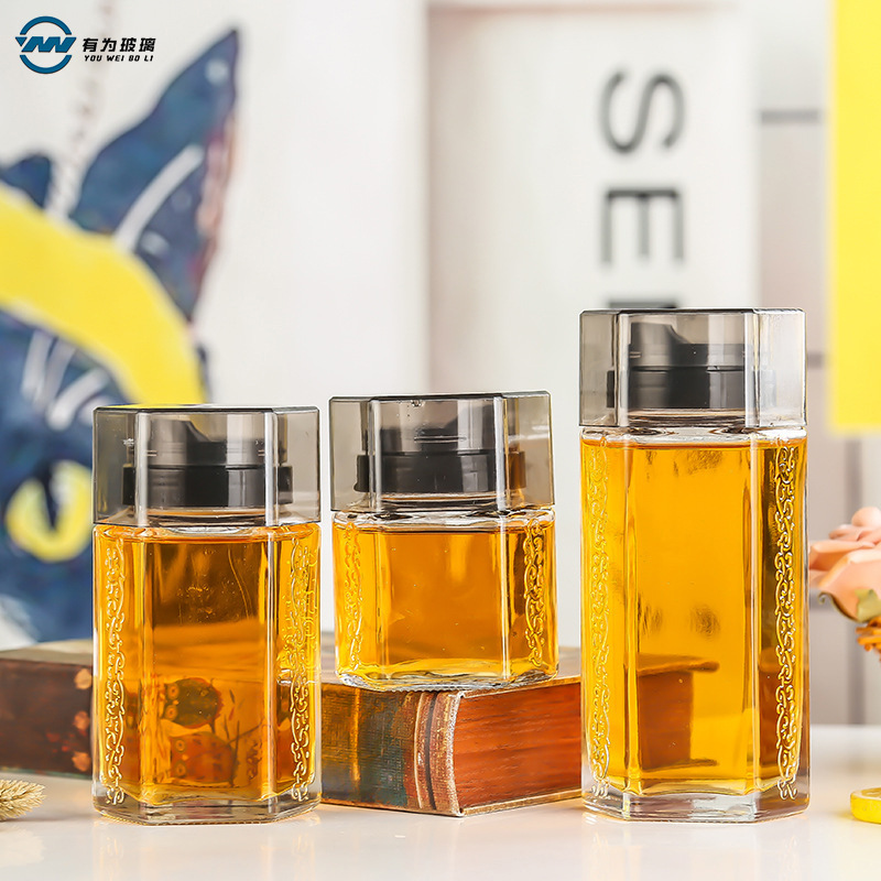 厂家批发新款玻璃蜂蜜瓶尖嘴加厚带罩六棱密封罐圆形鱼胶燕窝瓶