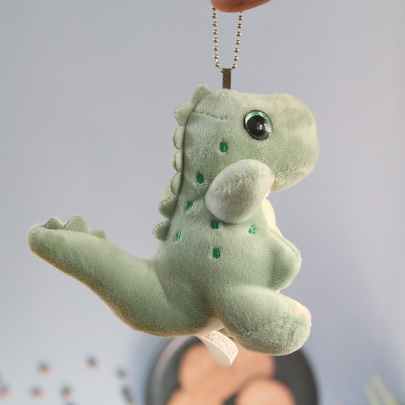 Pequeño dinosaurio muñeca de peluche llavero mochila colgante lindo Tyrannosaurus muñeca pareja mochila accesorios colgantes moda