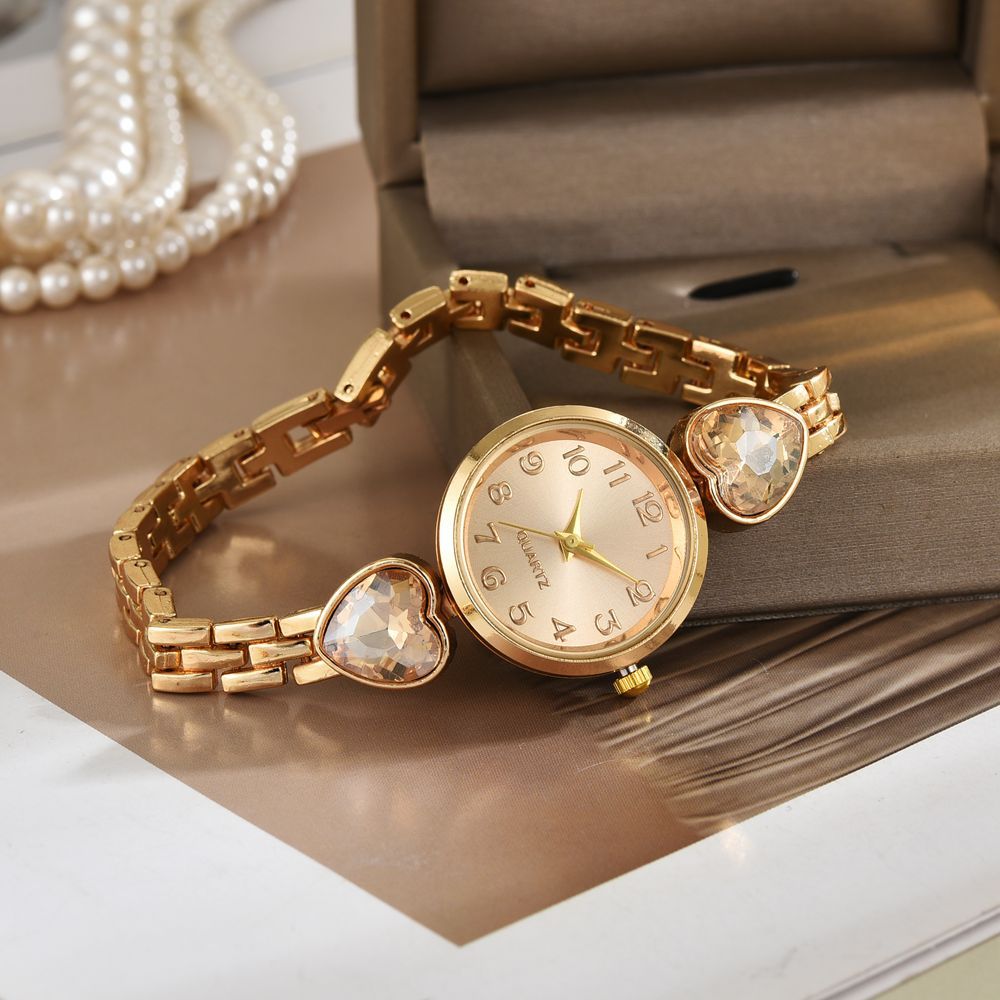 AliExpress nuevo reloj de lujo simple esfera digital redonda femenina temperamento de moda amor pulsera pequeña reloj de mujer