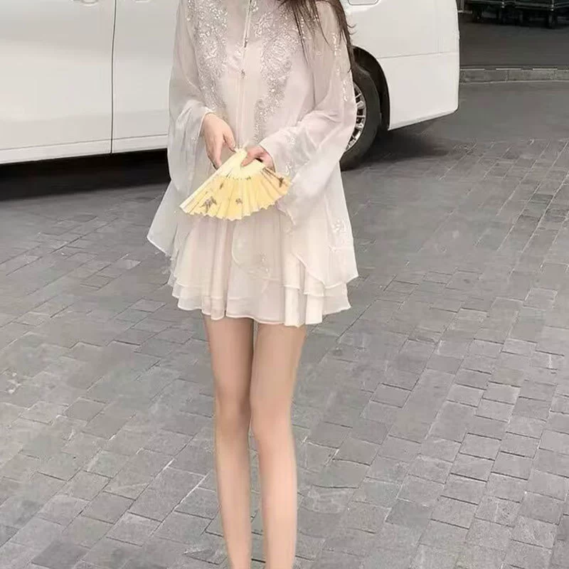 Новый китайский стиль, художественный высококлассный свободный крой, облегающий комплект из тонкого топа и юбки, улучшенная версия для лета 2025 года.