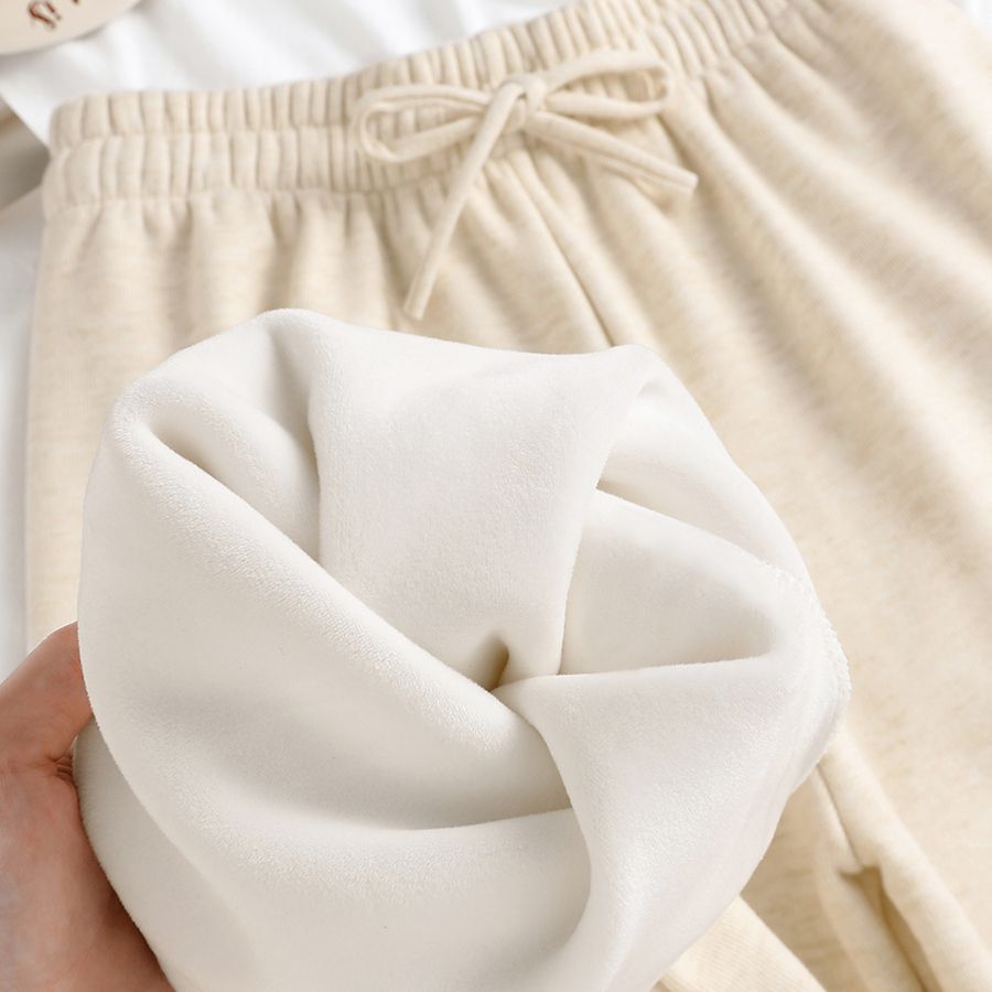 狭い版のもち米のズボンの女性の秋冬の杏色のベルベットの高い腰の垂れ下がった感じのゆったりしています。