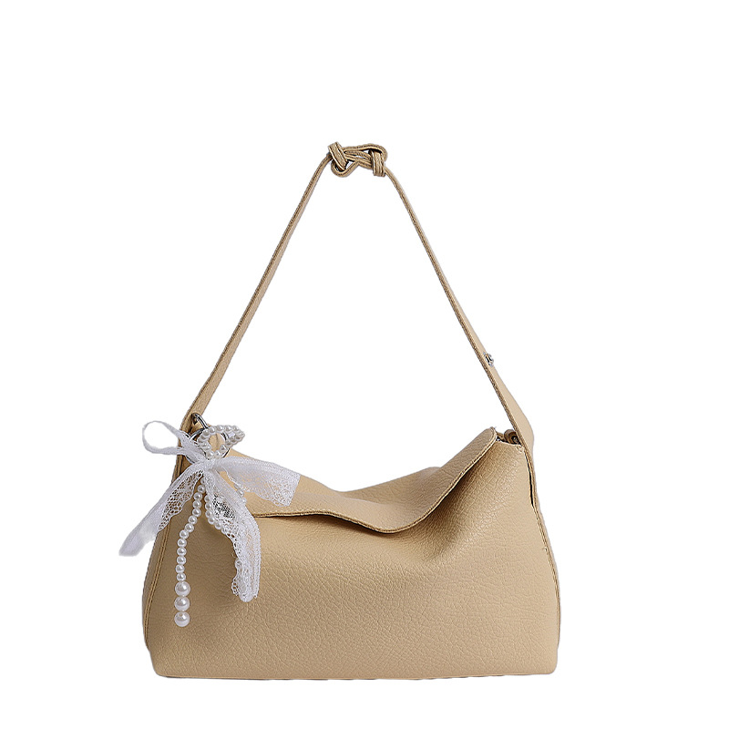 Bolsa de hombro portátil de gran capacidad para mujeres 2026 sensación cotidiana de lichi estampado bolso de almohada coreano bolso de brazo
