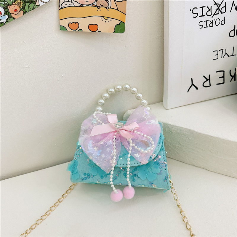 Nueva princesa de dibujos animados bolsos infantiles lindos bolsos de arco de moda chica perla bolsos de hombro