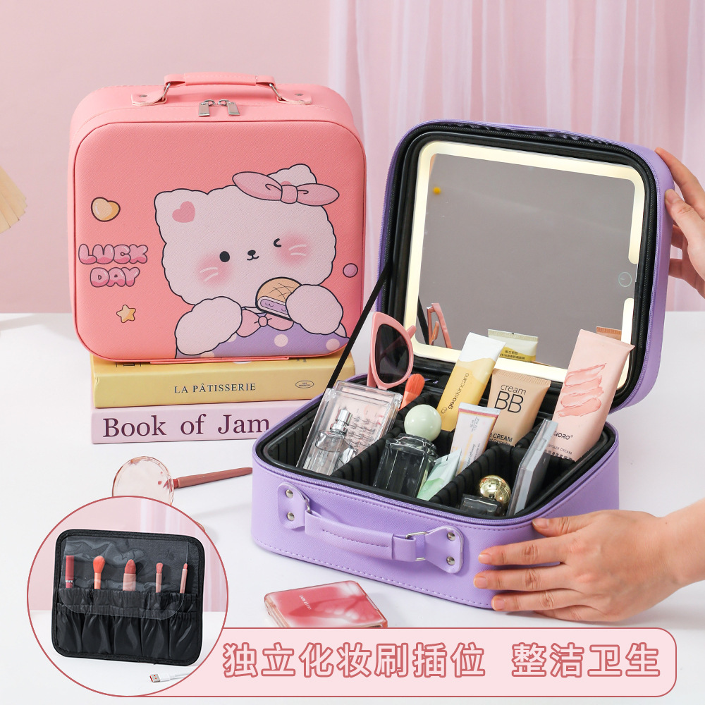 Nueva caja de maquillaje de dibujos animados con lámpara LED con partición maleta multifuncional portátil de gran capacidad de alto valor de maquillaje