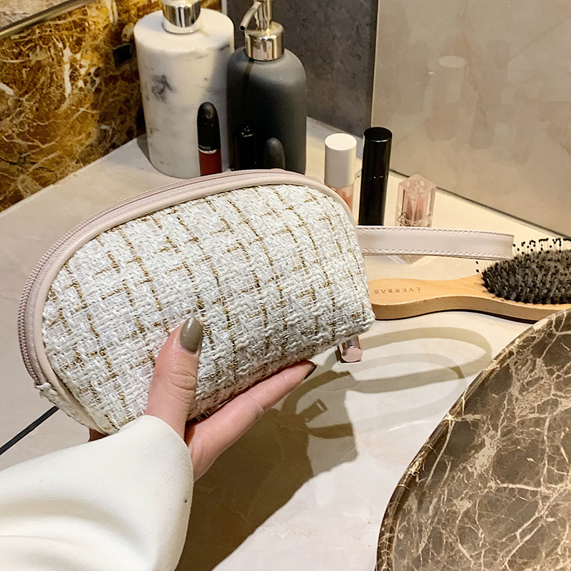 Estilo coreano Denim Chanel estilo de mano bolsa de cosméticos de alto aspecto tejido tablero de gran capacidad lápiz labial bolsa de almacenamiento al por mayor