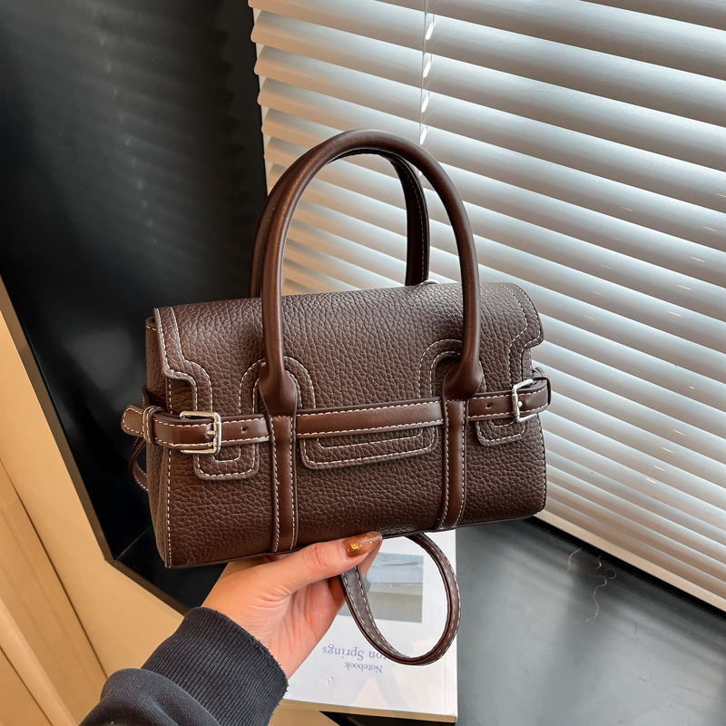 Bolso de mano transfronterizo de mujer 2025 nuevo nicho de invierno de alta calidad bolso de mujer de viaje retro mochila de hombro