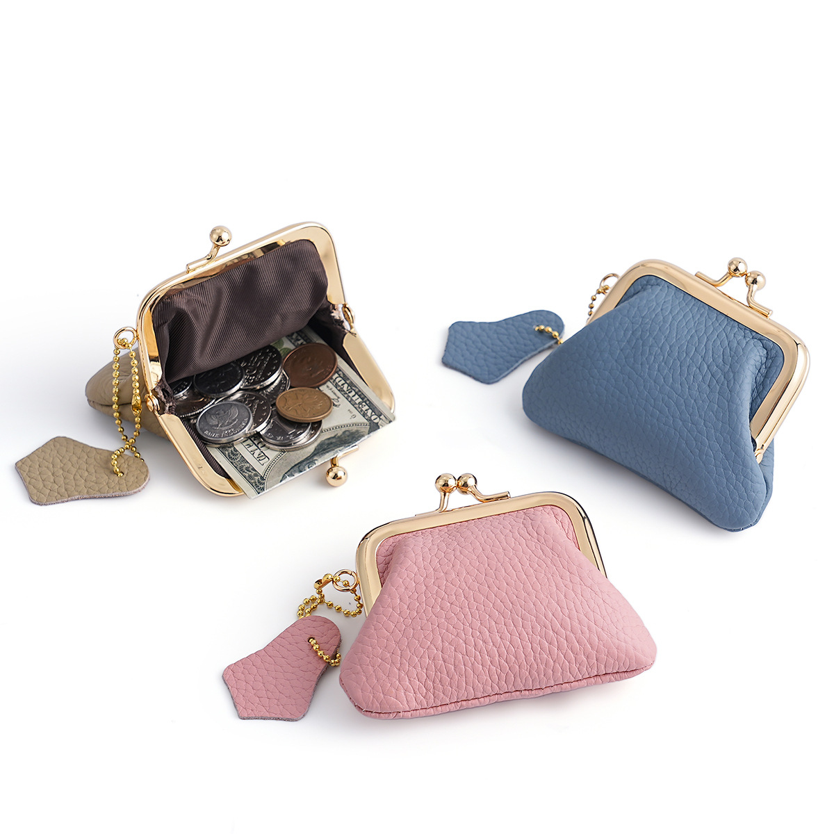 Factory direct new mini coin purse, trendy Japanese and Korean style, top layer cowhide coin purse, clip purse, genuine leather wallet.