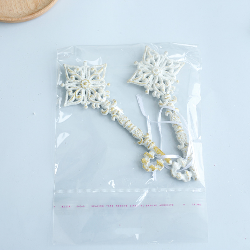 Fábrica de decoraciones de Navidad de oro platino campana de plástico amor hecho a mano árbol de Navidad decoración colgante en stock