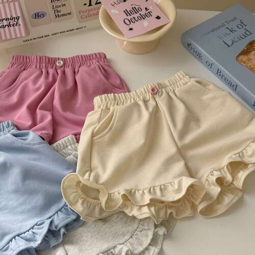 Factory wholesale girls 'fashionable shorts 0-6 years old summer baby solid color Korean lace pants for children with fungus edge
