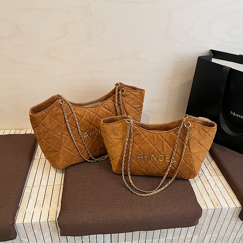 Bolsa de cadena de diamante transfronteriza bolsa de gran capacidad bolsa tote para mujeres otoño y invierno 2025 nueva bolsa de hombro de viaje de mano bolsa de brazo