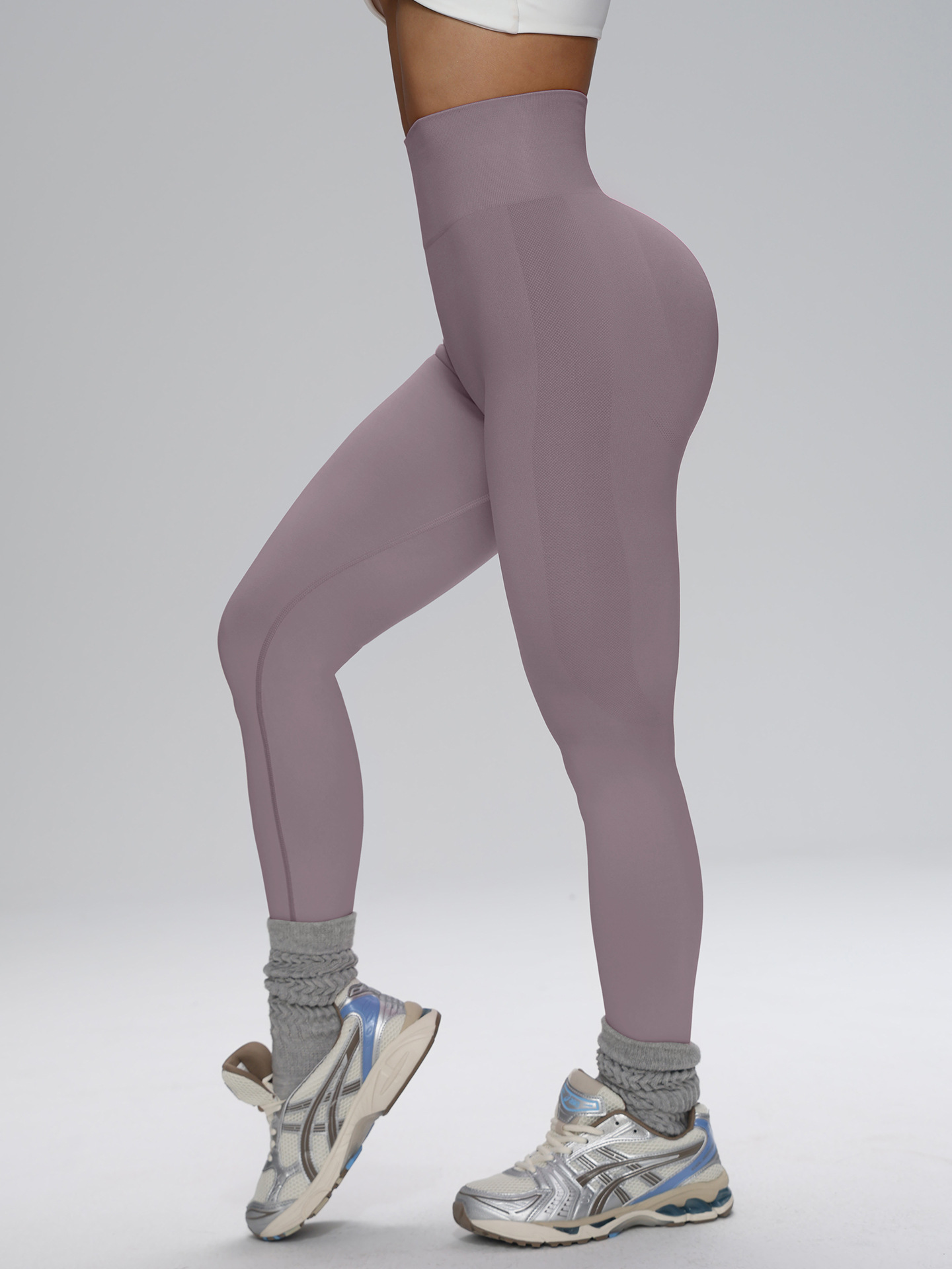 Europa y los Estados Unidos sin costuras cintura alta pantalon de gimnasio de alta cadera para mujeres corriendo al aire libre apertado nueve pantalones de pelusa de miel