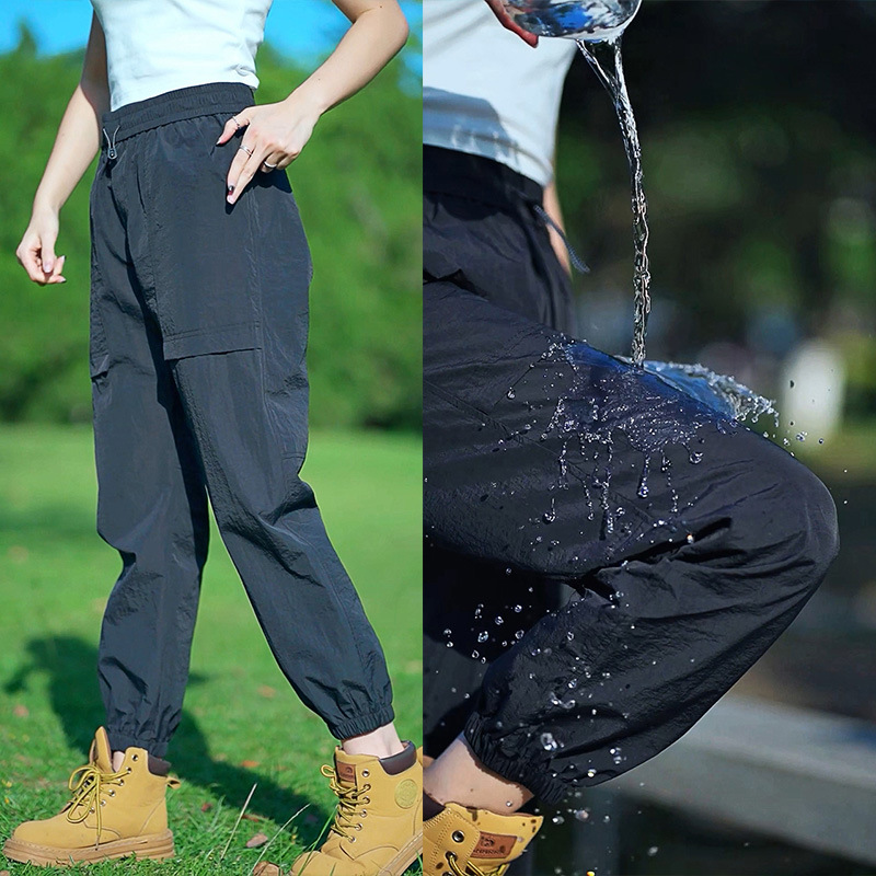 Fábrica directa de pantalones secos rápidos para hombres y mujeres de verano nuevos pantalones ligeros y transpirables parejas sueltos de pies deportivos casuales de nueve puntos
