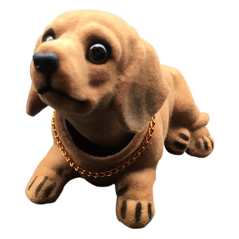 Suministro directo de fábrica resina flocado simulación salchicha perro cabeza móvil perro decoración del coche accesorios del coche simulación perro Decoración