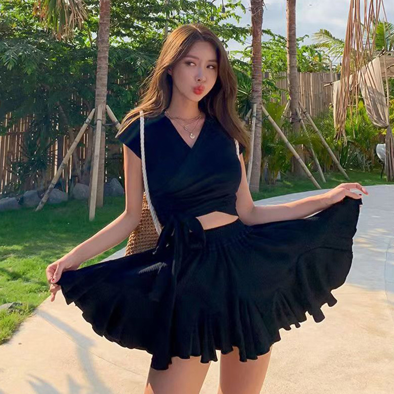 Traje de baño de las mujeres de la División de las mujeres de color sólido de la moda Conservador vientre adelgazar falda francesa nicho avanzado traje de baño de aguas termales