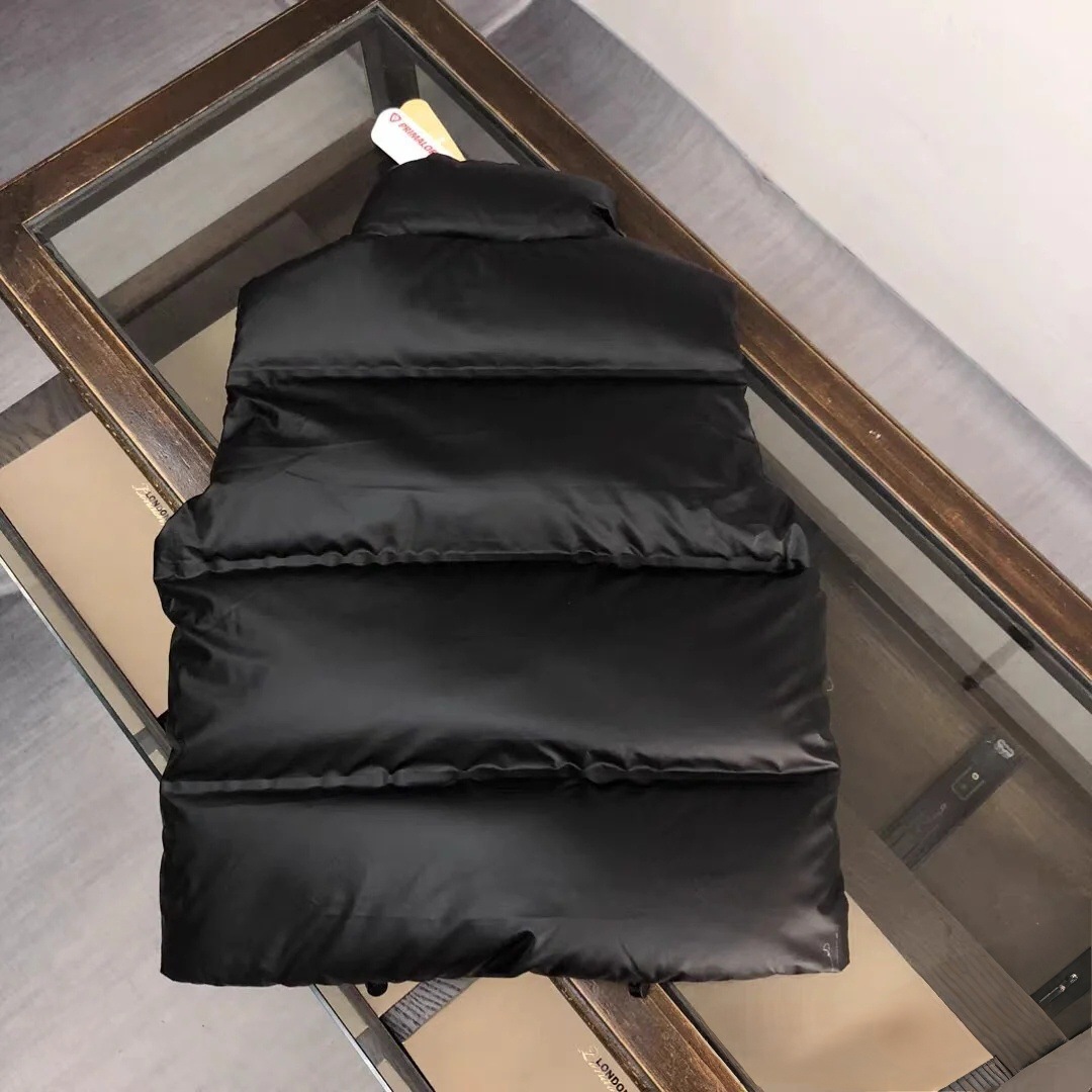 Marca de moda de invierno europea pan abrigada y esponjosa chaqueta de plumón Pujia con cremallera chaqueta casual de moda para hombres y mujeres en stock