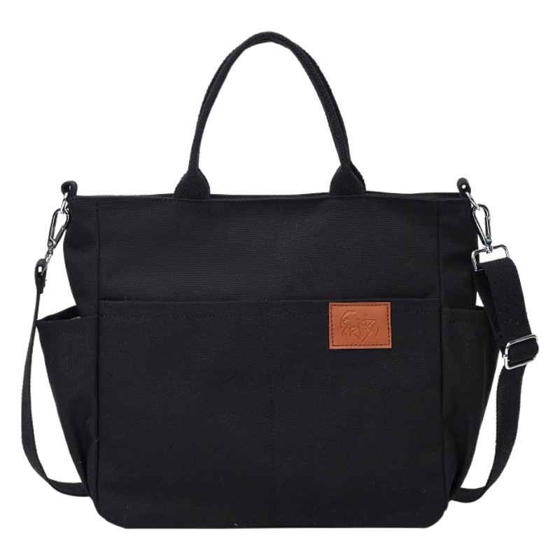 Bolso de lona con diseño de nicho, nuevo bolso tote de gran capacidad, bolso de hombro versátil para ir al trabajo, bolso informal para mujer