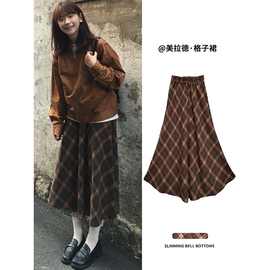 美拉德棕色半身裙女秋冬2025新款高腰a字中长款复古毛呢格子裙