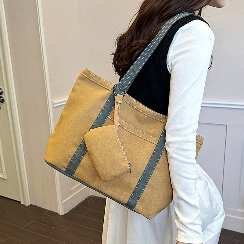 Gran capacidad y estilo extranjero, bolsos especiales de soporte personalizados, empalmes de lona, nuevos bolsos de axilas de cercanías, bolsos individuales simples y personalizados