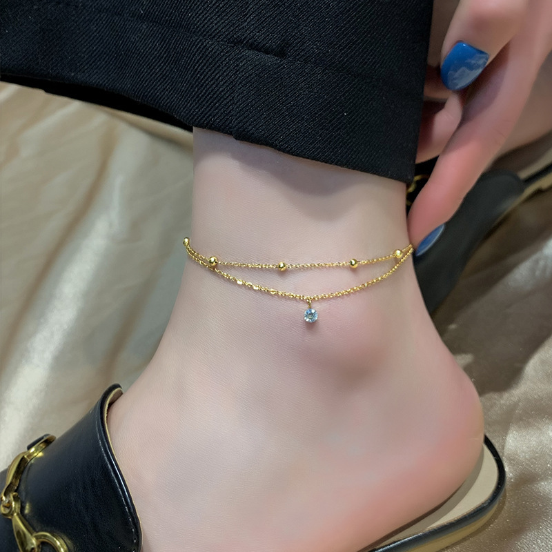 Doble capa de un solo diamante de acero de titanio pulsera femenina sensación exquisita versátil nueva moda ligera lujosa alta sensación flash pulsera de diamante pie accesorios