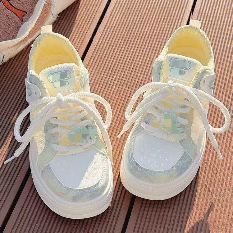 Zapatos de mujer de verano zapatos blancos 2026 nuevo nicho de malla transpirable zapatos de pan de suela gruesa zapatos de skate de moda para mujeres
